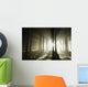 Sunbeams enters coniferous stand on a misty autumn morning Wall Mural