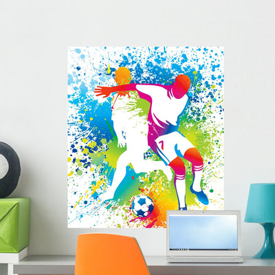 Football Players with Soccer shown on a wall