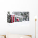 Red telephone and post box in the snow Wall Mural