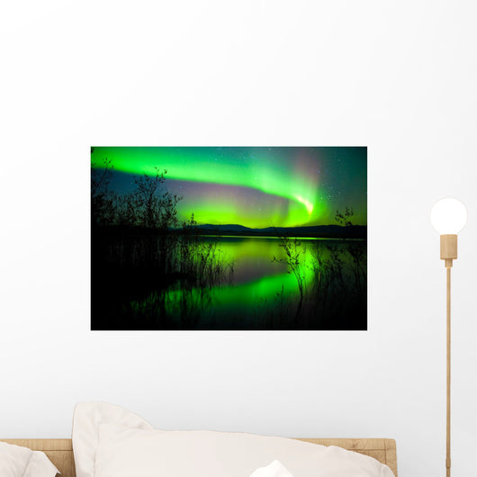 Northern lights mirrored on lake Wall Mural