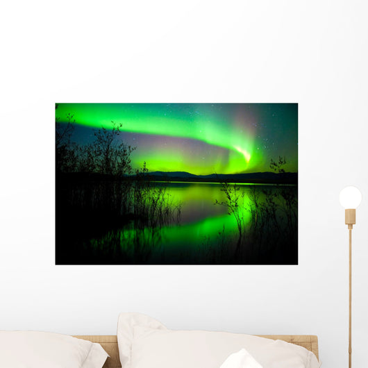 Northern lights mirrored on lake Wall Mural