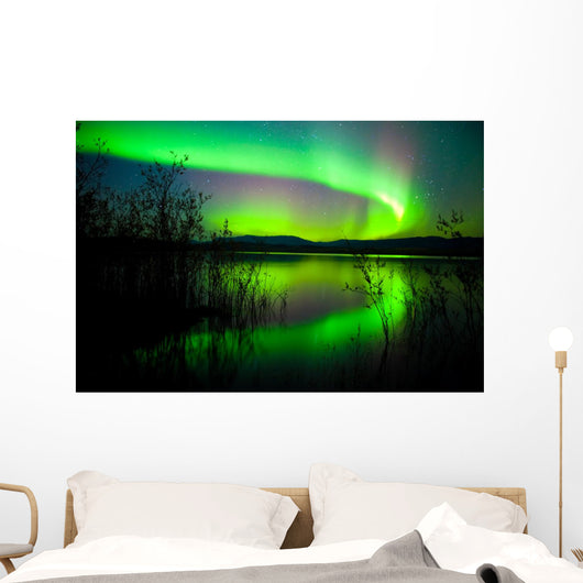 Northern lights mirrored on lake Wall Mural
