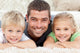 Children with Father Smilling
