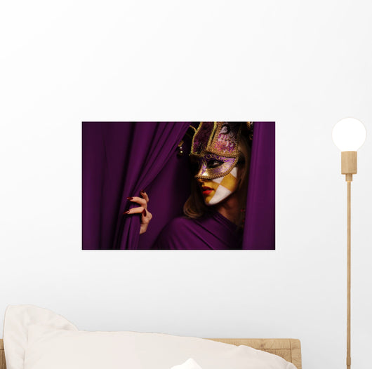 pretty young woman in violet mask Wall Mural