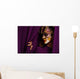 pretty young woman in violet mask Wall Mural