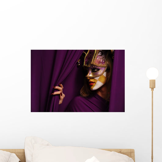 pretty young woman in violet mask Wall Mural