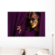 pretty young woman in violet mask Wall Mural