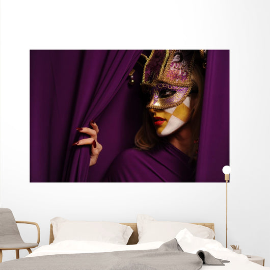pretty young woman in violet mask Wall Mural