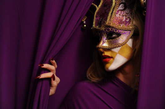 pretty young woman in violet mask Wall Mural