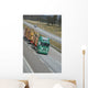 timber delivering truck on highway Wall Mural