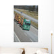 timber delivering truck on highway Wall Mural
