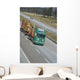 timber delivering truck on highway Wall Mural
