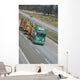 timber delivering truck on highway Wall Mural