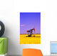 Oil Pumpjack In A Canola Field Wall Mural