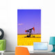 Oil Pumpjack In A Canola Field Wall Mural