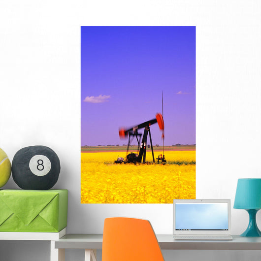 Oil Pumpjack In A Canola Field Wall Mural