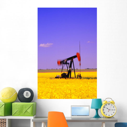 Oil Pumpjack In A Canola Field Wall Mural