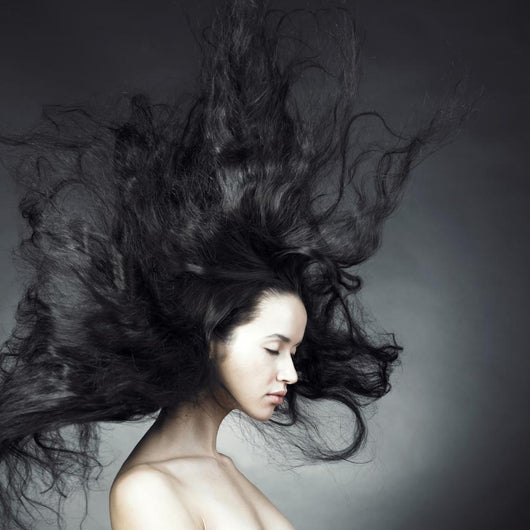 Beautiful woman with magnificent hair Wall Mural
