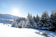 Blue sky over snowy white mountains Wall Mural