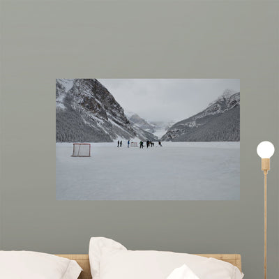 Pond Hockey Wall Mural shown on a wall
