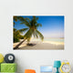 Liegestuhl unter Palmen am Traumstrand Wall Mural