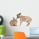 Chihuahua interacting with a rabbit in front of white background Wall Decal