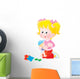 Girl playing with her doll Wall Decal