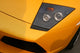 yellow supercar headlight Wall Mural