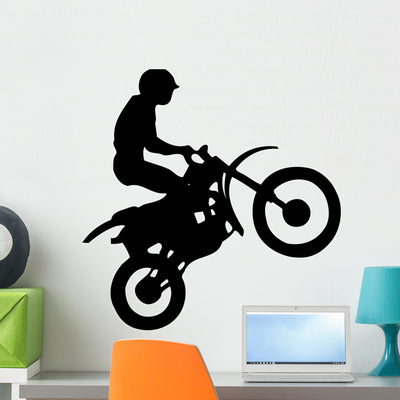 Freestyle Motorcyclist Wall Mural shown on a wall