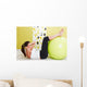 Beauty, young girl behooves gym exercise with ball Wall Mural