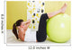 Beauty, young girl behooves gym exercise with ball Wall Mural