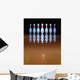 Old, battered bowling pins in dark background Wall Mural