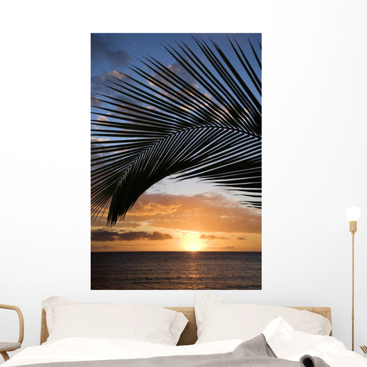sunset framed by palm, maui, hawaii. Wall Mural