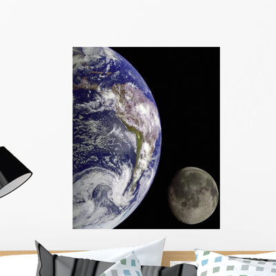 Earth from Outer Space Wall Mural shown on a wall