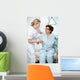 Nurse helps a patient to get up in hospital Wall Mural