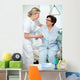 Nurse helps a patient to get up in hospital Wall Mural
