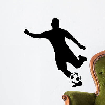 Soccer Silhouettes Wall Decal shown on a wall