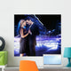 Handsome young couple dancing on the street and smiling Wall Mural