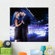 Handsome young couple dancing on the street and smiling Wall Mural