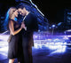 Handsome young couple dancing on the street and smiling Wall Mural