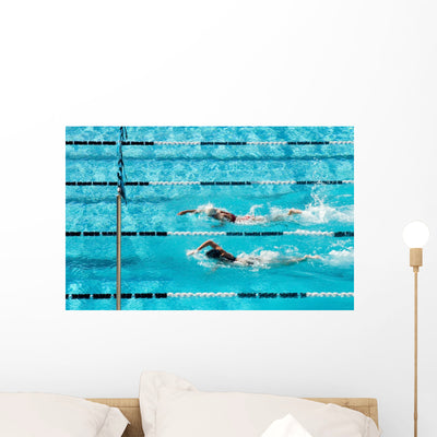Competitive Swimming Wall Mural shown on a wall
