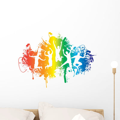 Jumping People Ink Splat Wall Decal shown on a wall