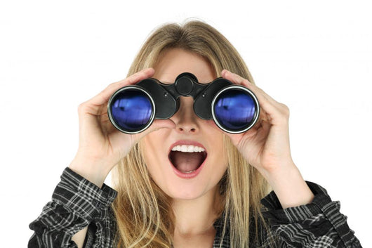 Woman with Binoculars Looking