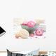Spa scene with pink  flowers in water Wall Mural