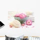 Spa scene with pink  flowers in water Wall Mural