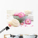 Spa scene with pink  flowers in water Wall Mural