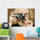 Woman Holding Vintage Camera Wall Mural