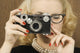 Woman Holding Vintage Camera Wall Mural