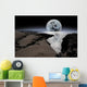 Shimmering Moon and Boulders
