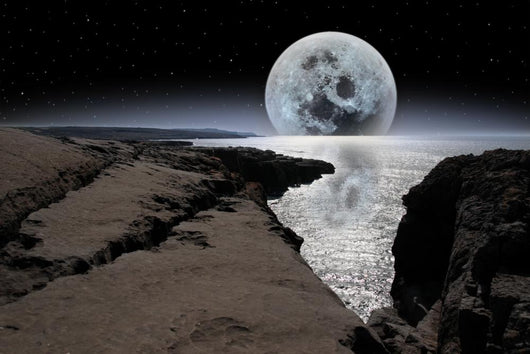 Shimmering Moon and Boulders